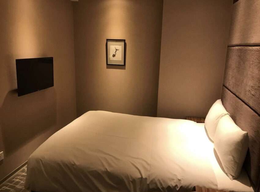 福泰桔子商旅文化店の廊下と客室入口。嘉義のローカル文化をモチーフにしたデザイン